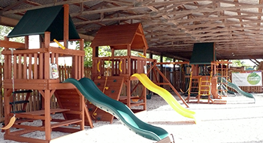 Visit Play King at the Sunrise warehouse to plan your perfect playset or swing set installation, sales, and service on wood and vinyl playsets.