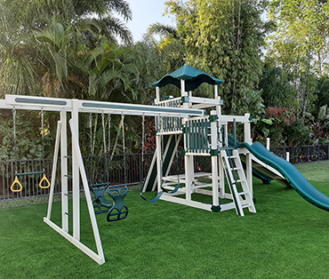 Swing Kingdom vinyl playset installed by Play King in Wellington, Florida- Palm Beach County