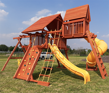 Here's a large angle base Woodplay playset Play King installed in Southwest Ranches, Florida.